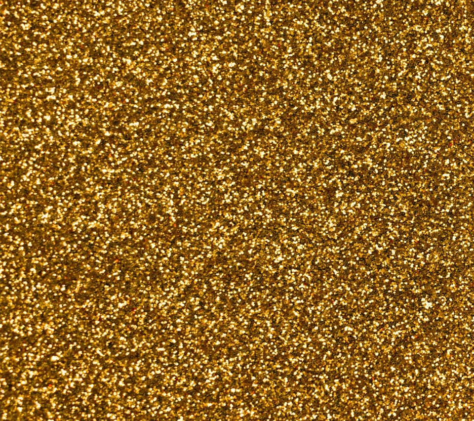 A close up of the gold color of a carpet.
