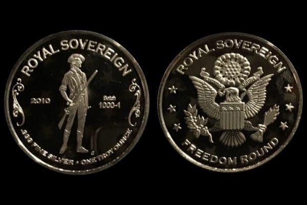 A coin with the royal sovereign and freedom rider on it.